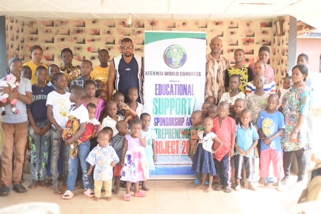Children, families, and community members during educational support outreach.